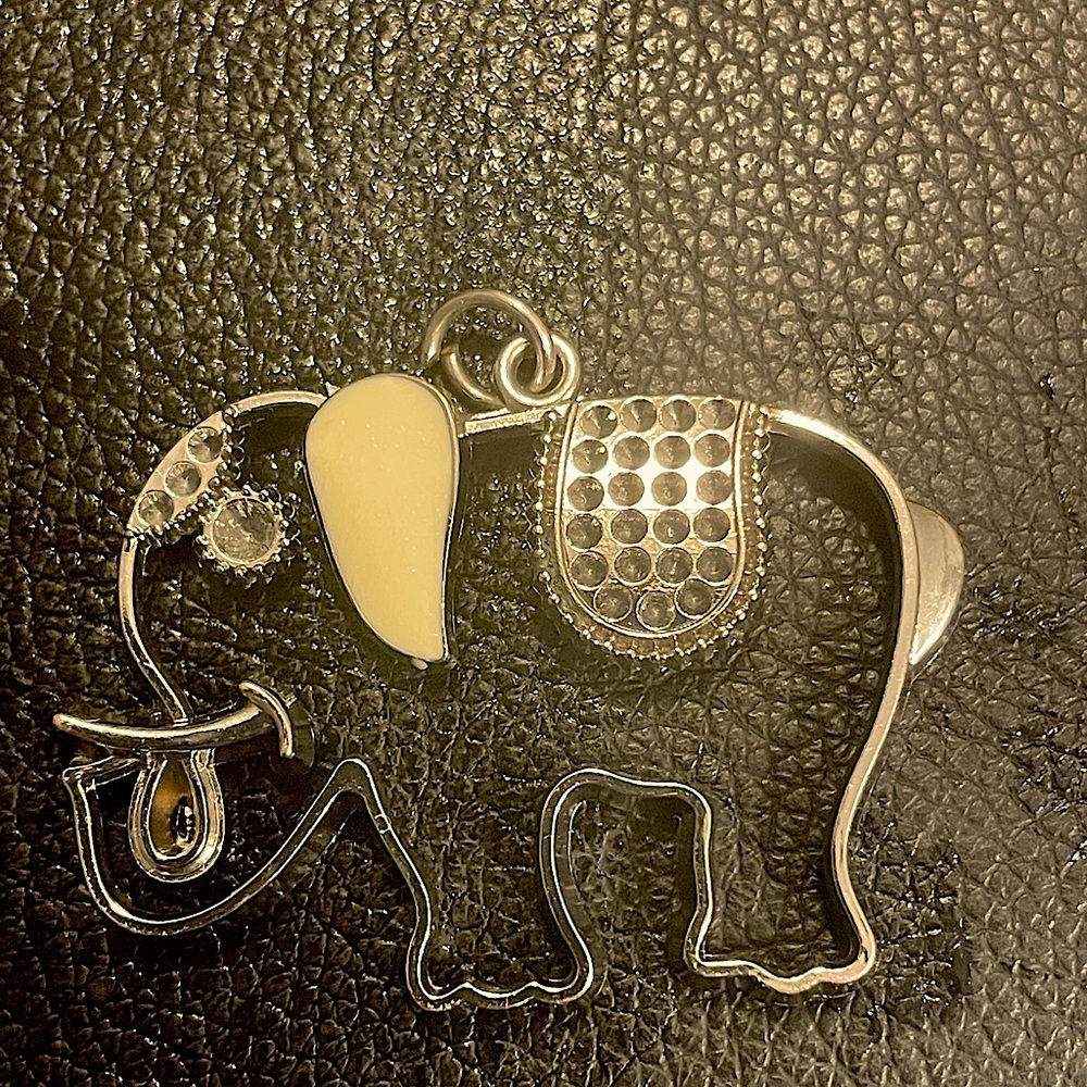 Elephant pendant, sterling silver with some off white enamel highlights.